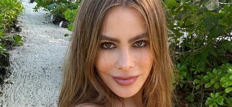 Sofia Vergara sunbathes topless in G